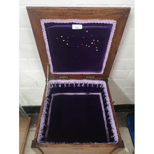 183 - 1900s sewing box with fitted purple interior.