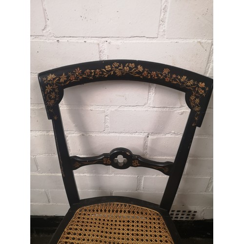 181 - 1900s chair with handpainted design with rattan base.