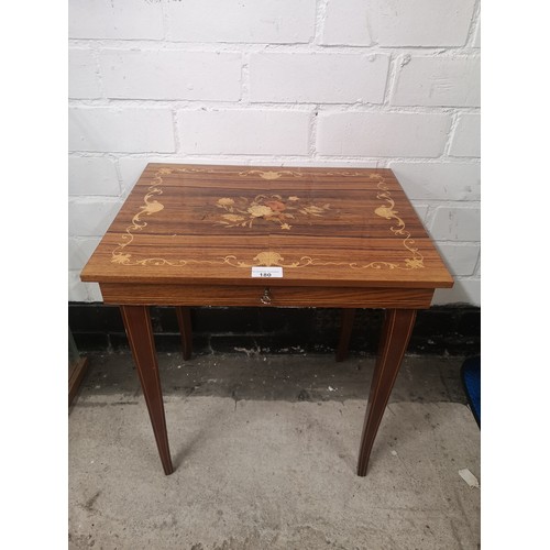 180 - Inlaid table with drawer.