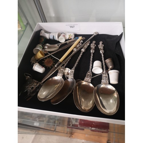 167 - Box of collectables to include aposil spoons.