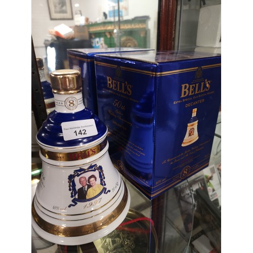 142 - Bells 50th golden anniversary Queen and Duke decanter 1997 full sealed with box.