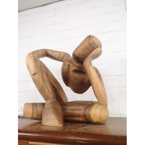 303 - Large wooden man sculpture.