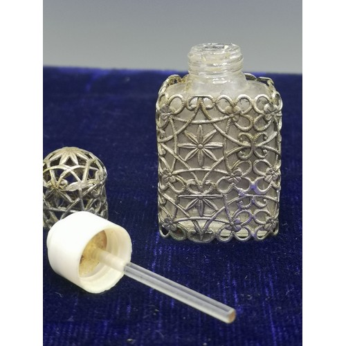 15 - Victorian fillagree perfume bottle with stopper and lid.