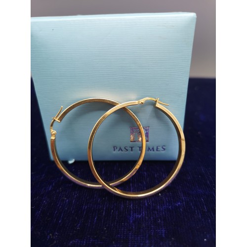 45a - Pair of 9ct gold large hoop earrings.