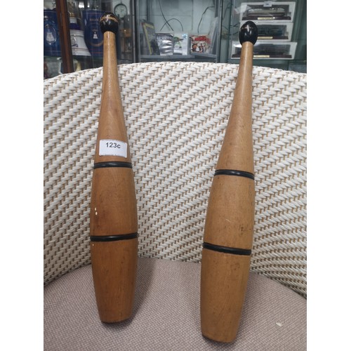 123C - Pair of vintage juggling sticks.