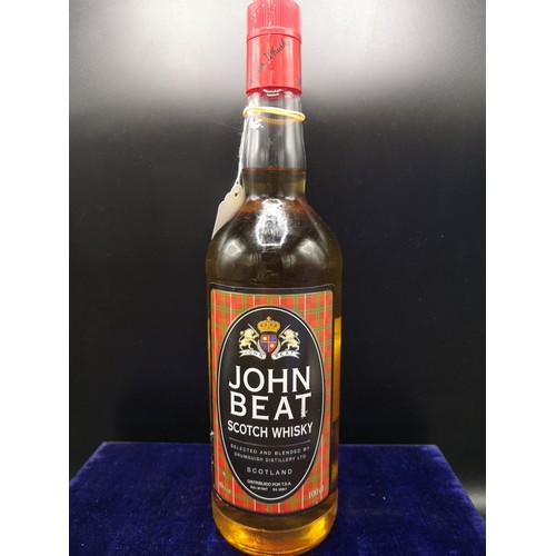 233 - Bottle of John beat scotch whisky. 100cl. Full and sealed.