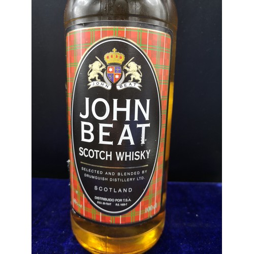 233 - Bottle of John beat scotch whisky. 100cl. Full and sealed.