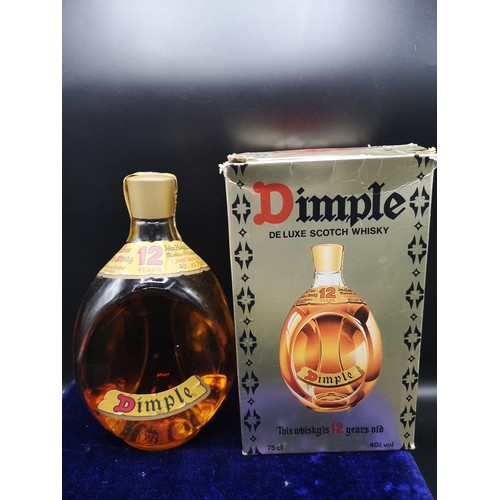 234 - Old 1970's bottle of 12 year old de luxe scotch whisky with vintage presentation box. 75cl.