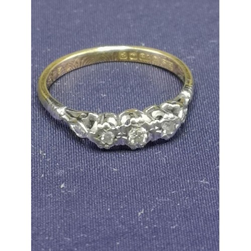 3 - 18ct gold 3 diamond stone ring. 2.5 grams..