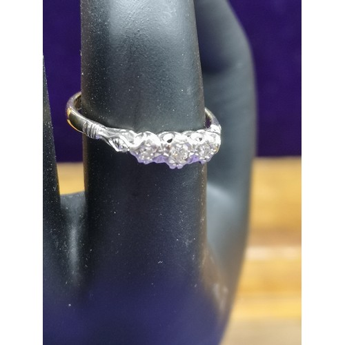 3 - 18ct gold 3 diamond stone ring. 2.5 grams..