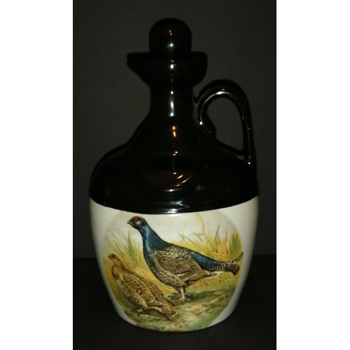 464 - Montrose pheasant scene whisky flagon.