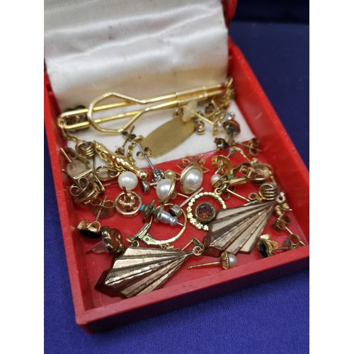 49 - Collection of gold earrings includes 9ct, 9ct gold tbar etc.