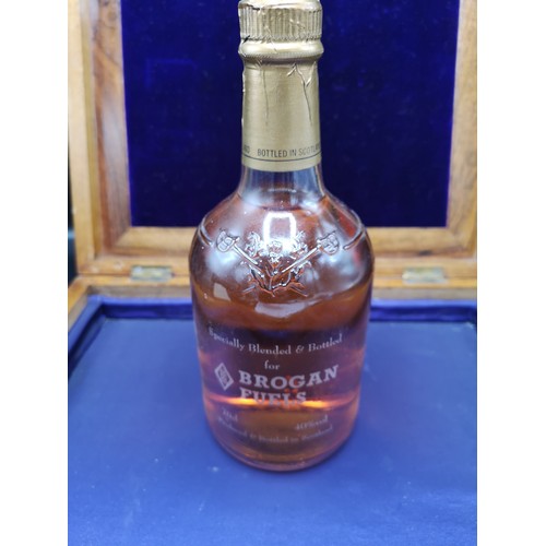 230 - Bottle of brogan fuels bottled in Scotland whisky full and sealed.