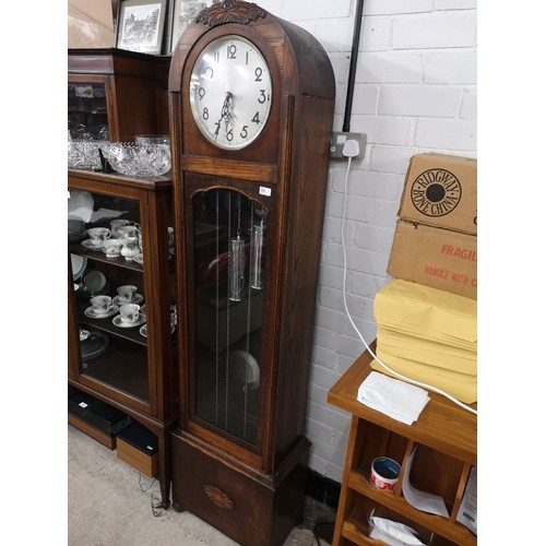 223 - Art deco Oak cased grand father clock with pendulum and weights.