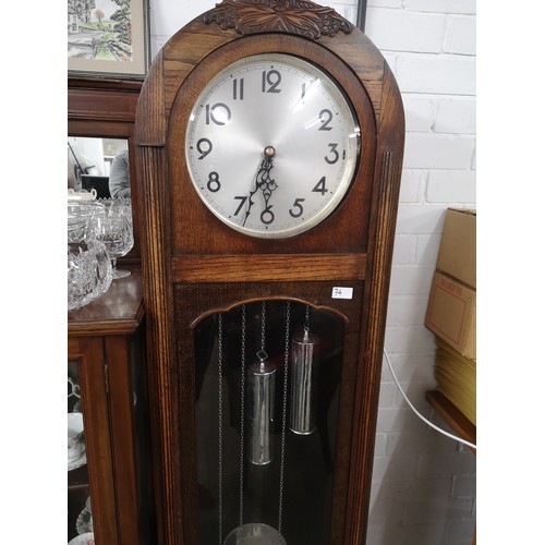 223 - Art deco Oak cased grand father clock with pendulum and weights.