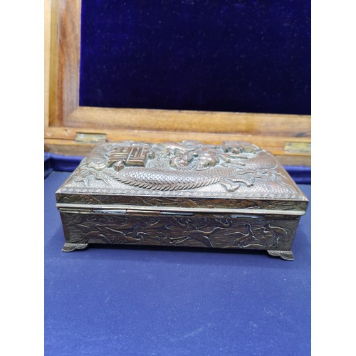 67a - Oriental bronze / brass box depicting dragon, storks to side.