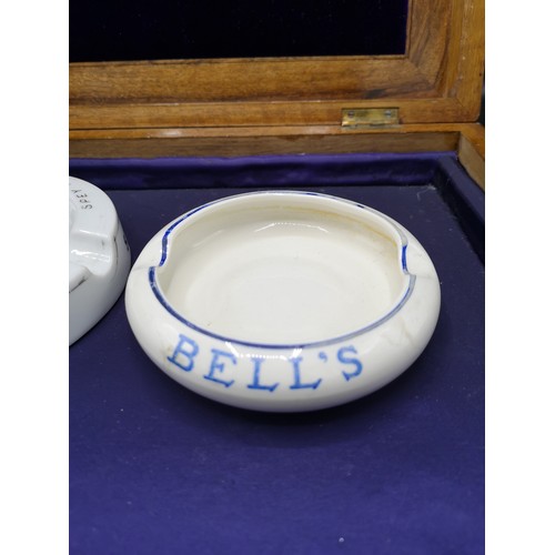 94 - Gilbeys spey royal match stricker ashtray together with bells whisky rare ashtray.