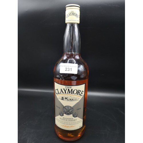 231 - Bottle of Claymore blended scotch whisky 1 litre full and sealed.