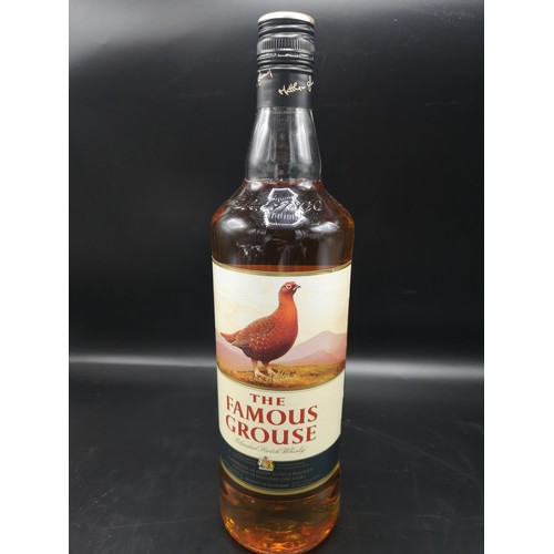 236 - Bottle of The famous grouse scotch whisky 1 litre full and sealed.