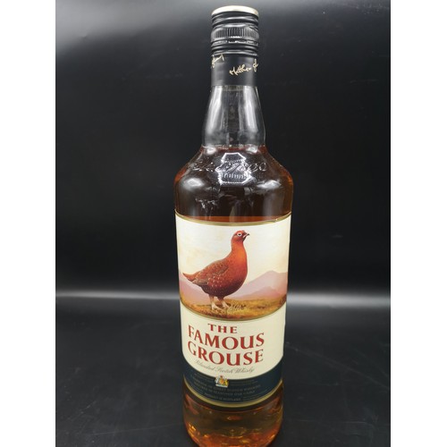 236 - Bottle of The famous grouse scotch whisky 1 litre full and sealed.