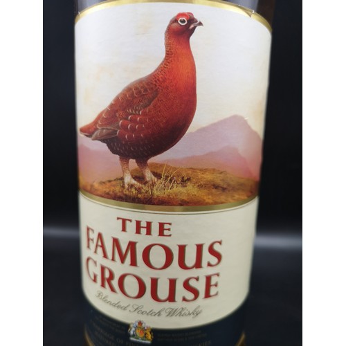 236 - Bottle of The famous grouse scotch whisky 1 litre full and sealed.