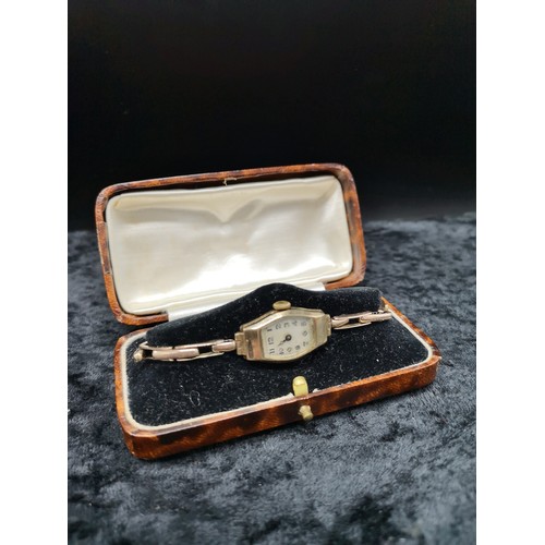 1 - 9ct 375 Hall Marked ladies wrist watch. Needs service as found .