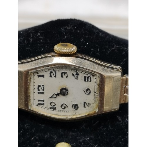 1 - 9ct 375 Hall Marked ladies wrist watch. Needs service as found .