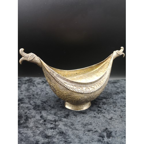 8 - Indian Silver ornate boat vase with decorative edges.