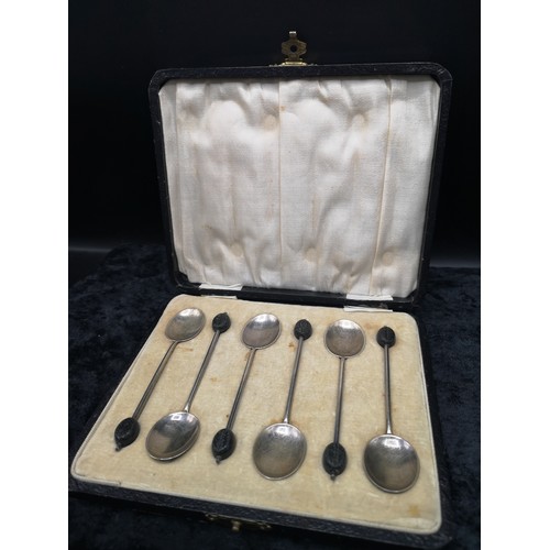 9 - Set of 6 silver Hall marked coffee bean spoons in fitted case.