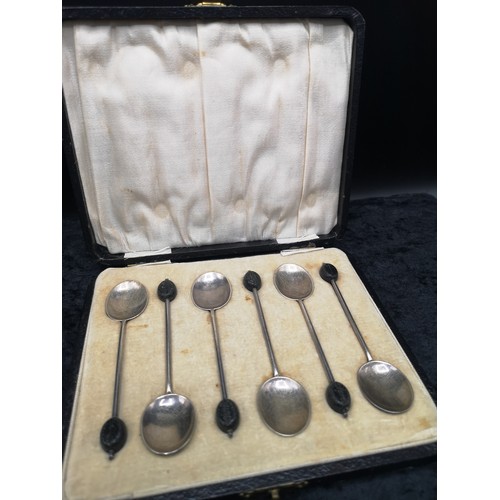 9 - Set of 6 silver Hall marked coffee bean spoons in fitted case.