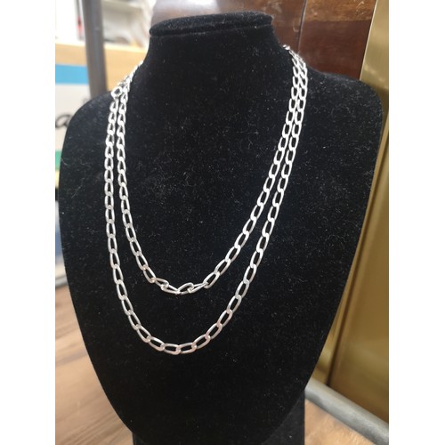 59a - Long silver curb style chain.