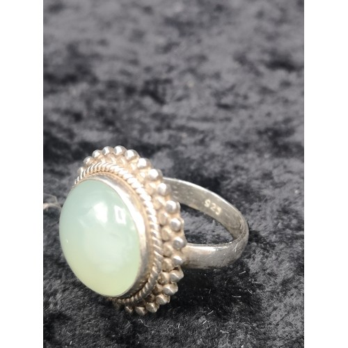 43a - Silver 925 ring set in pale green stone.