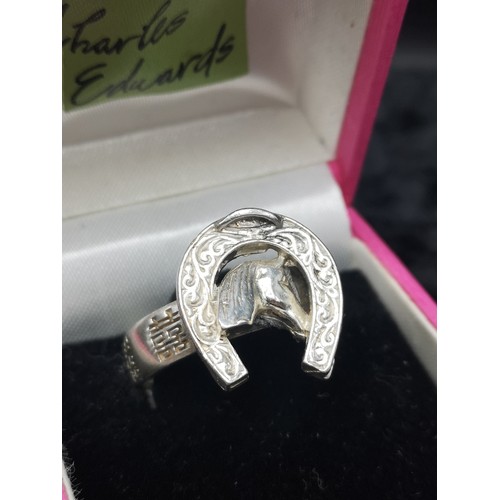 41a - Heavy silver 925 horse shoe ring with horse head.