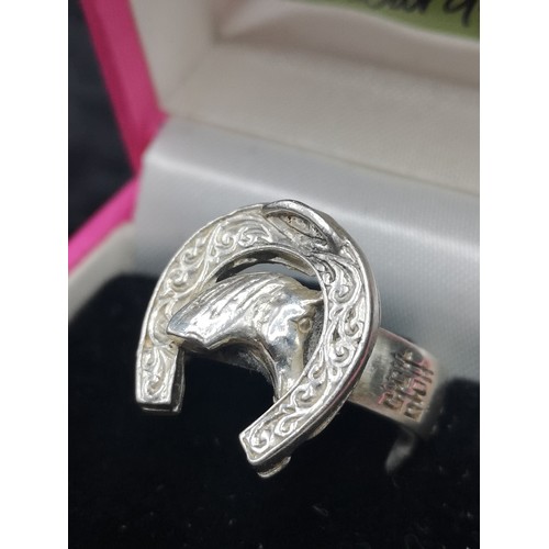 41a - Heavy silver 925 horse shoe ring with horse head.