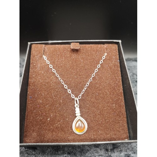 39 - Silver necklace in Amber setting.