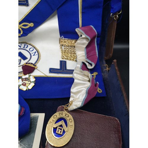 90 - Masonic apron set with medal and jewel in fitted leather casing.