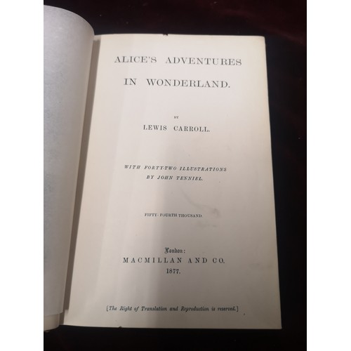 75b - 1st edition alice adventures in to wonderland by lewis caroll dated 1877.