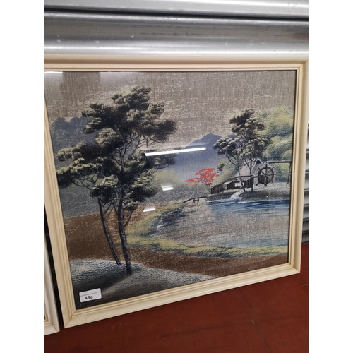 48a - Pair of Early Oriental silks in fitted frames.