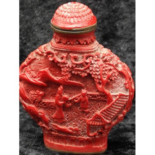 44 - Oriental cinbar carved perfume bottle.