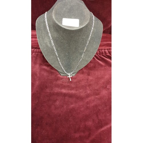 19a - Silver 24 inch figaro chain with cross.