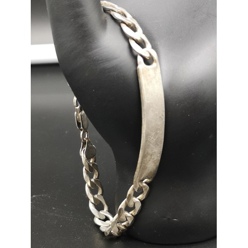 50a - Silver I'd bracelet 25 grams.