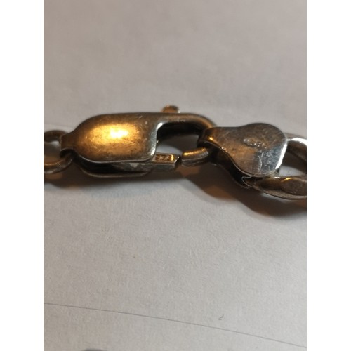 50a - Silver I'd bracelet 25 grams.