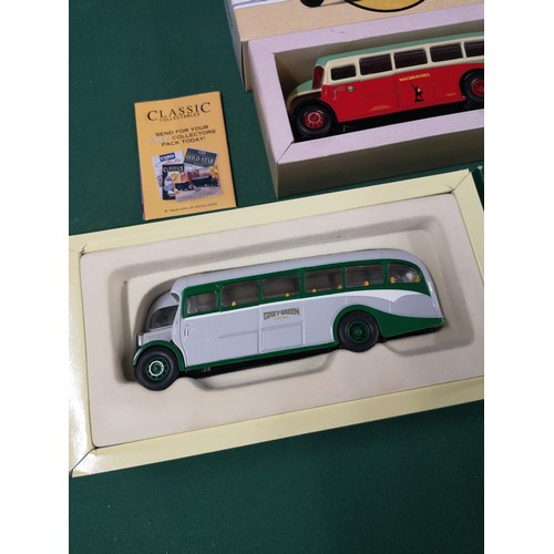 200 - 2 large corgi bus models.