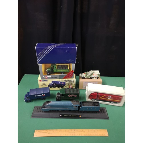 205 - Lot of corgi trucks and mallard train model.