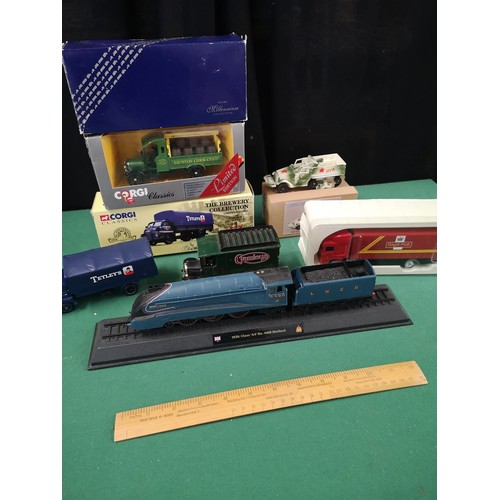 205 - Lot of corgi trucks and mallard train model.