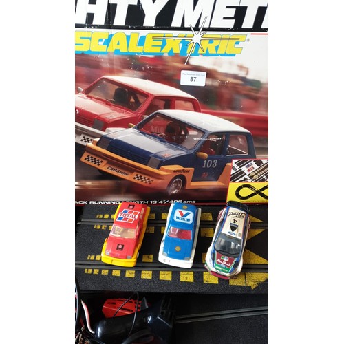 87 - Large Box of Scalextrics track and cars etc .