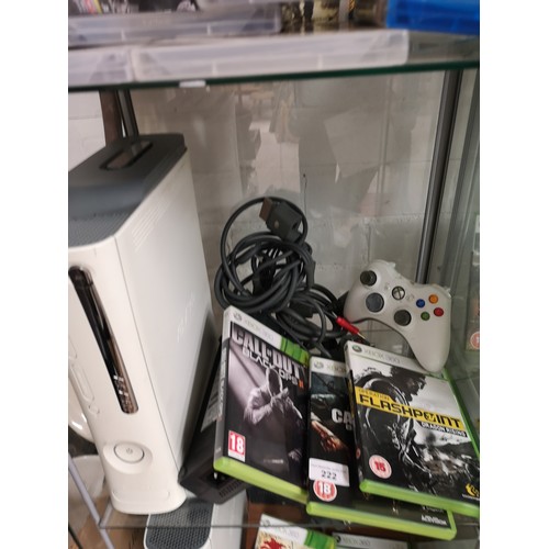 222 - Xbox 360 console power suply together with games and controller.