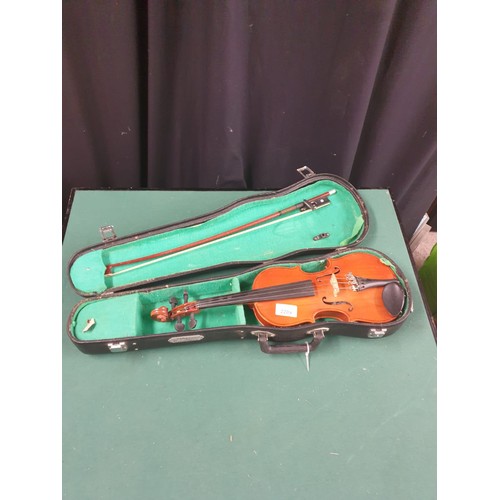 220a - Violin with bow in fitted case.