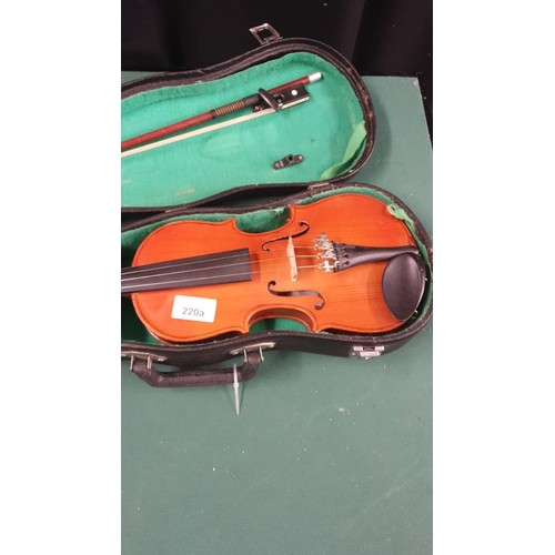 220a - Violin with bow in fitted case.