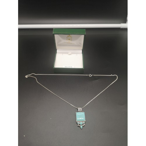 157 - Silver necklace set with Ornate Pendant in Turquoise stone.